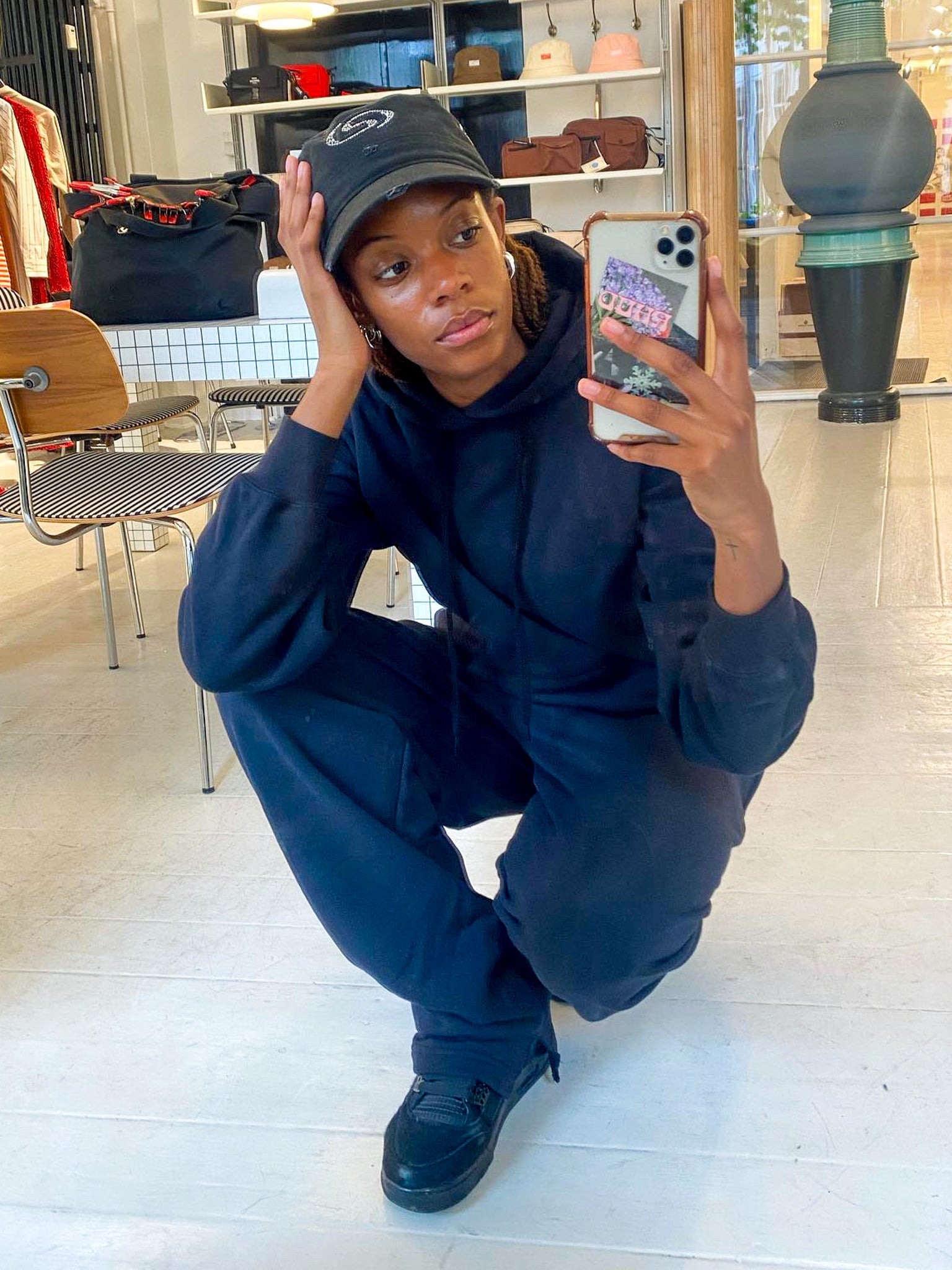 Jemimah is 174 cm long and wears size L in both sweats and hoodie. 